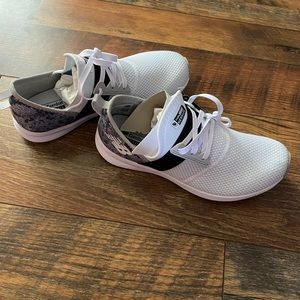 Brand new women’s New Balance snake skin sneakers. Size 7, with box. So cute